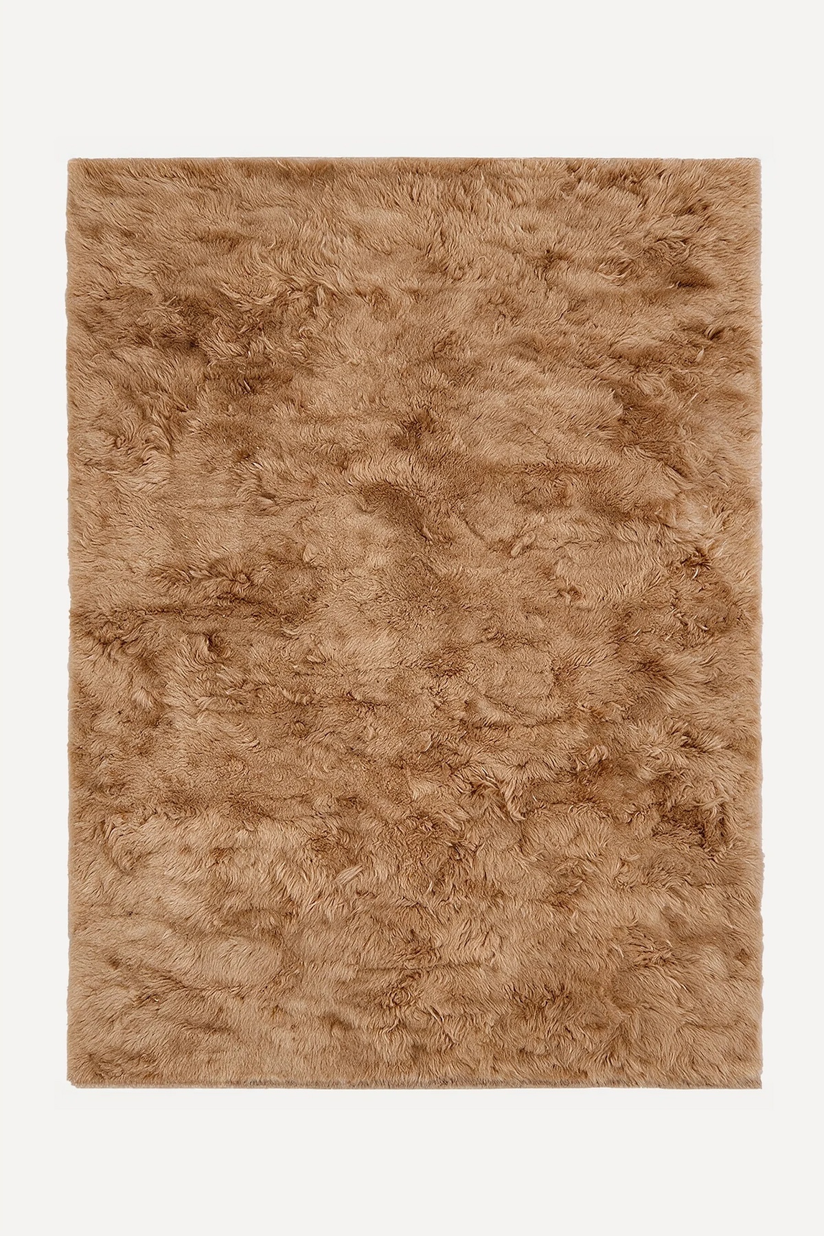 Camel hand-knotted shag wool rug by JUBI, shown flat from above