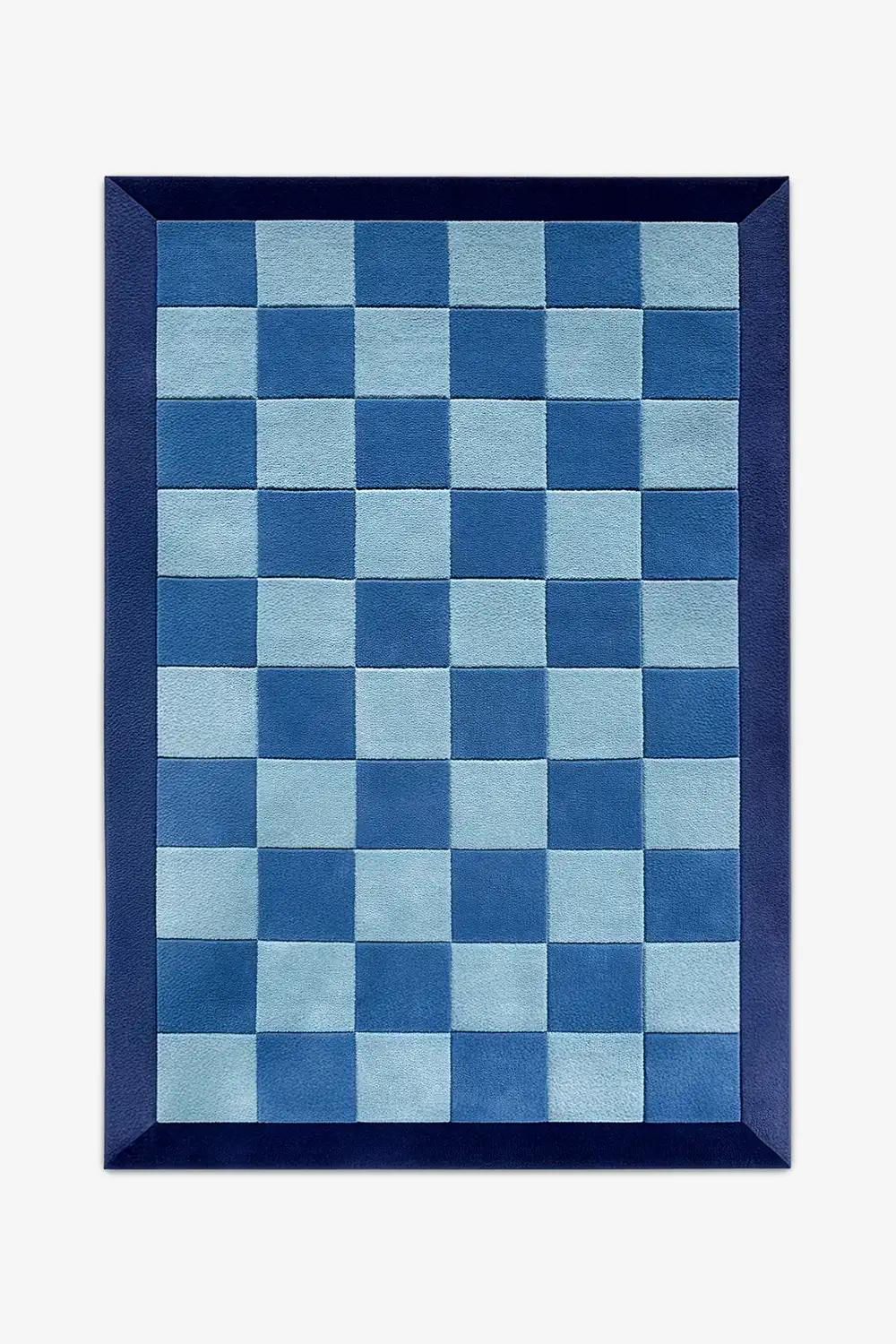 Blue checkered rug with a navy border in wool on a white background