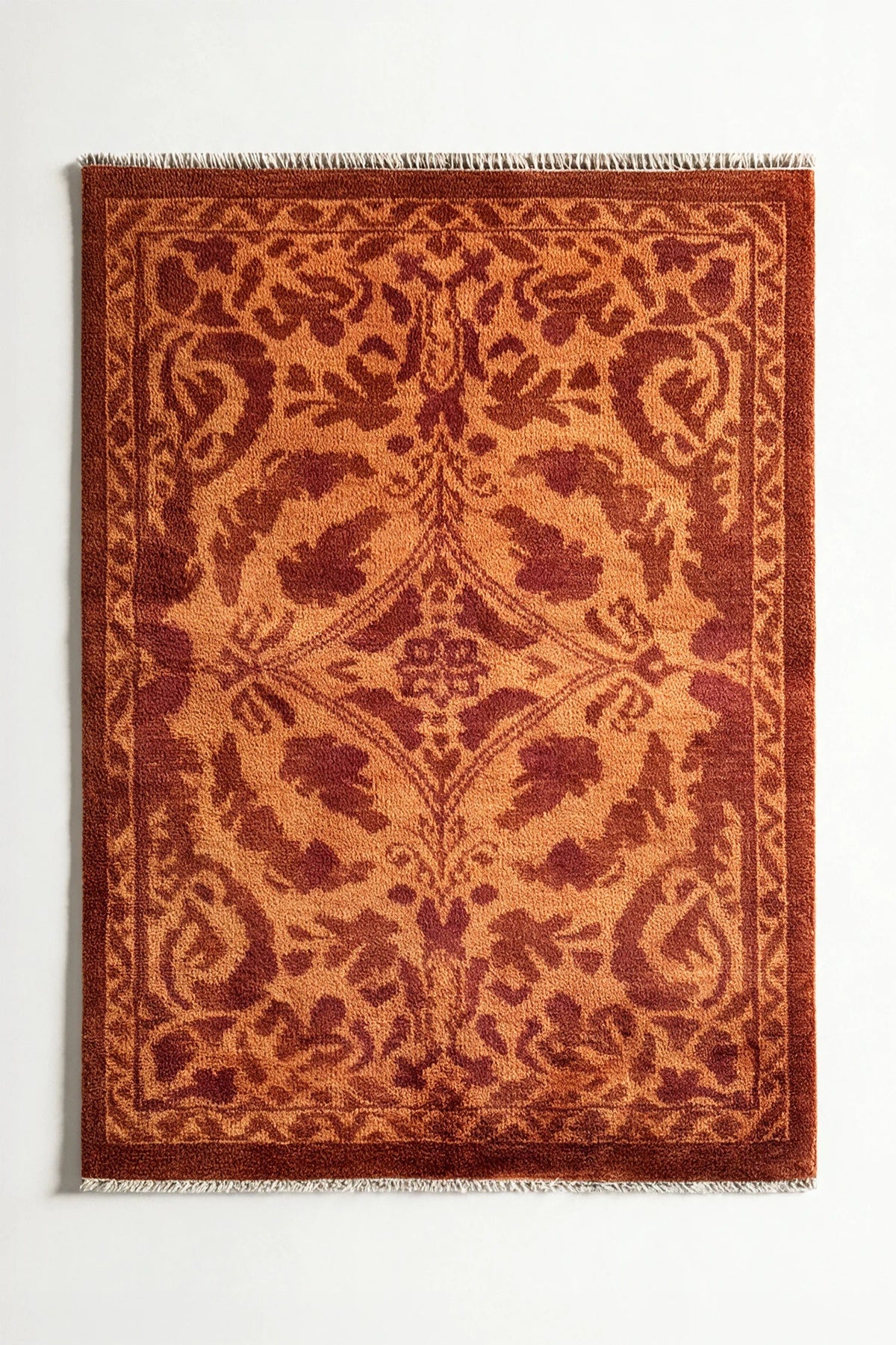Hand-knotted wool rug with intricate botanical pattern in rust red and gold, 8x10 area rug