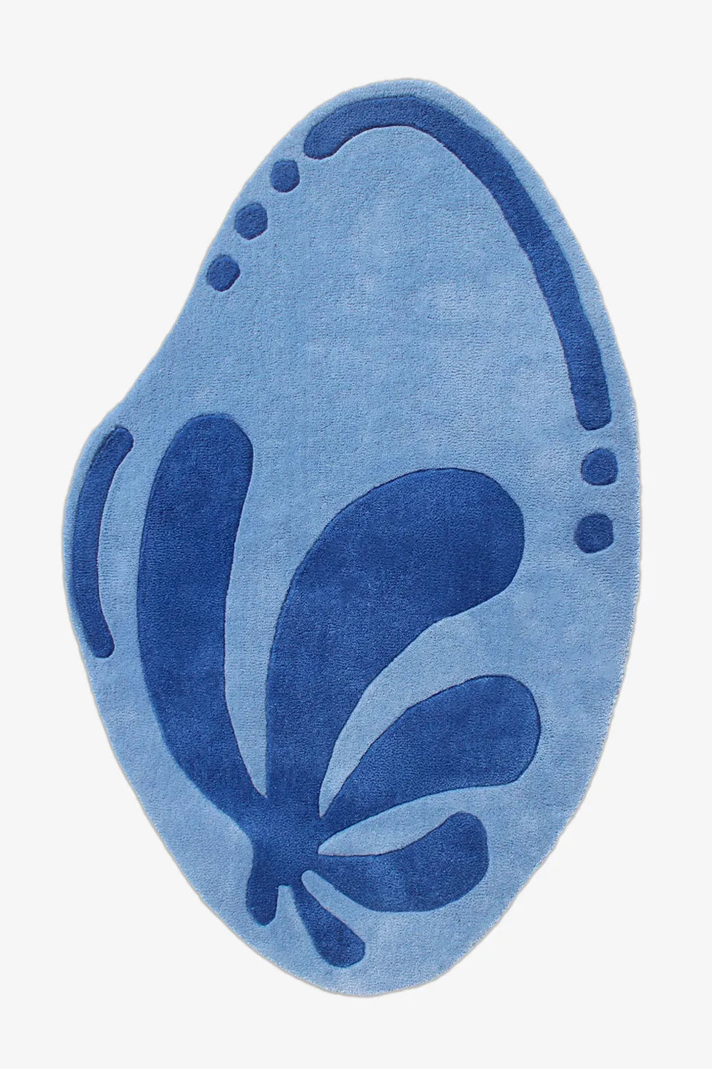 Blue abstract irregular shaped rug with organic cut and modern floral design