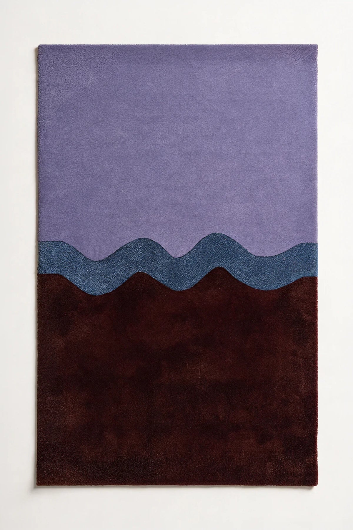 8x10 Hand-tufted purple and brown area rug with sculptural wavy design for modern living rooms and bedrooms