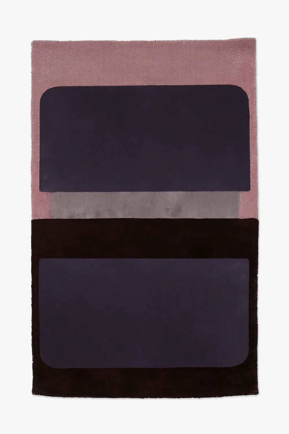 Modern colorblock wool area rug in pink, purple, and black, shown in 5x8 size